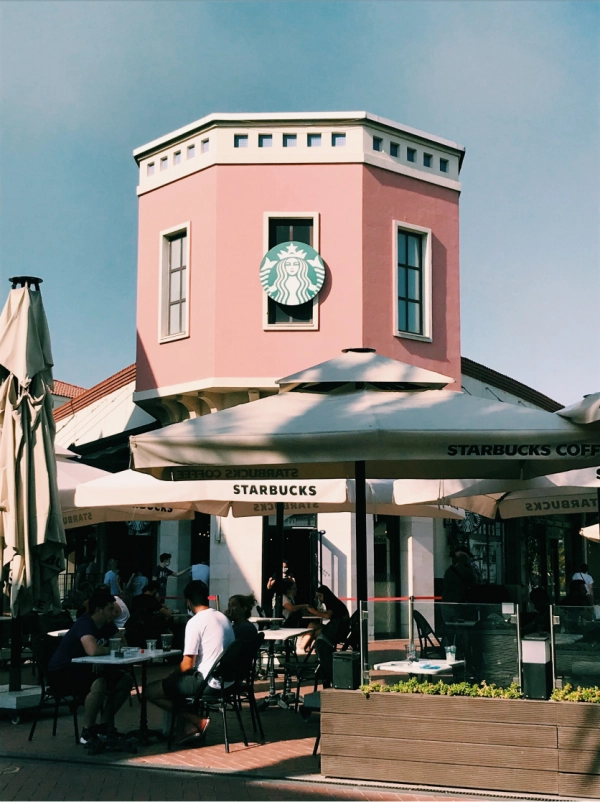 image of starbucks store painted pink on outside